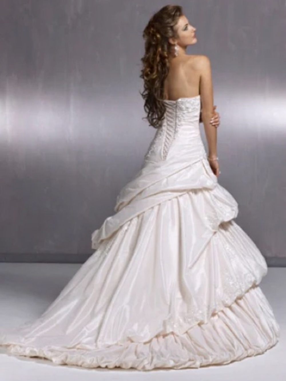Maggie Sottero Strapless Ivory Ball Gown with Lace-Up Back